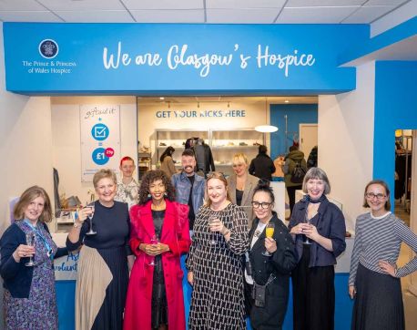 Launch of Worthwhile Wardrobe The Queen Street Hospice Shop team together with the team from the Adam Smith Business School at the University of Glasgow  Left to right Back row Volunteer Brian, Shop supervisor John, Shop Manager, Remony,  Front : Catriona Hunter, PPWH CEO Rhona Baillie, model Sophia, Angela Renton, Deirdre Shaw and Olga Cieslak