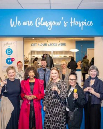 Launch of Worthwhile Wardrobe The Queen Street Hospice Shop team together with the team from the Adam Smith Business School at the University of Glasgow  Left to right Back row Volunteer Brian, Shop supervisor John, Shop Manager, Remony,  Front : Catriona Hunter, PPWH CEO Rhona Baillie, model Sophia, Angela Renton, Deirdre Shaw and Olga Cieslak