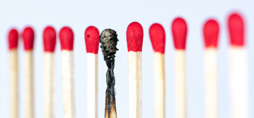Burned out matches representing exhaustion