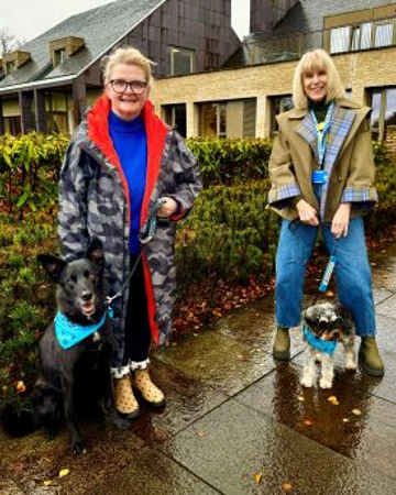 Two hospice supporters, Carlyn and Hazel with pooches Dexter and Bailey get ready for the Dog Dash 
